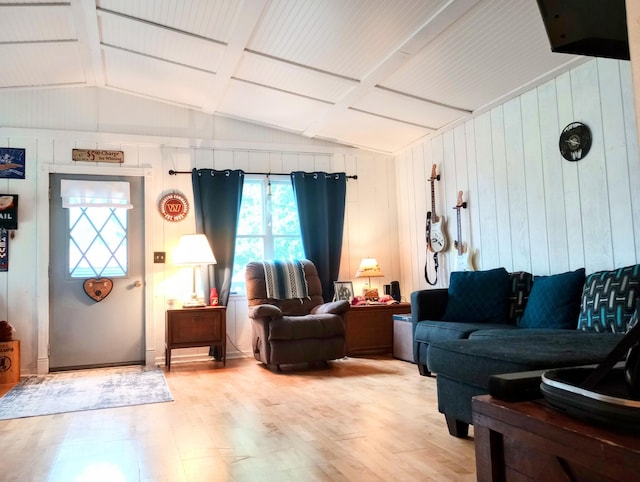 223 Mallard Ave, Houghton Lake, MI 48629 - living area featuring light wood-type flooring and wood walls