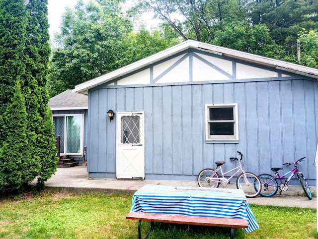 223 Mallard Ave, Houghton Lake, MI 48629 - view of outbuilding with entry steps