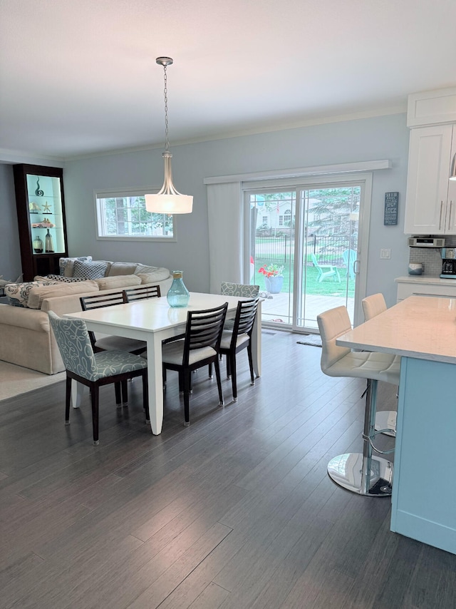 129 Ethel Dr, Roscommon, MI 48653 - dining room with dark wood finished floors and ornamental molding