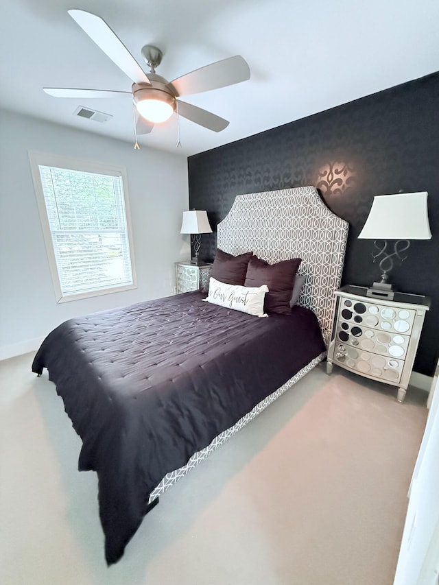 129 Ethel Dr, Roscommon, MI 48653 - carpeted bedroom with baseboards and a ceiling fan
