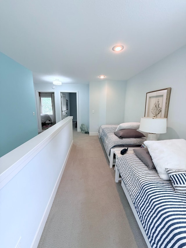 129 Ethel Dr, Roscommon, MI 48653 - bedroom with light colored carpet and recessed lighting