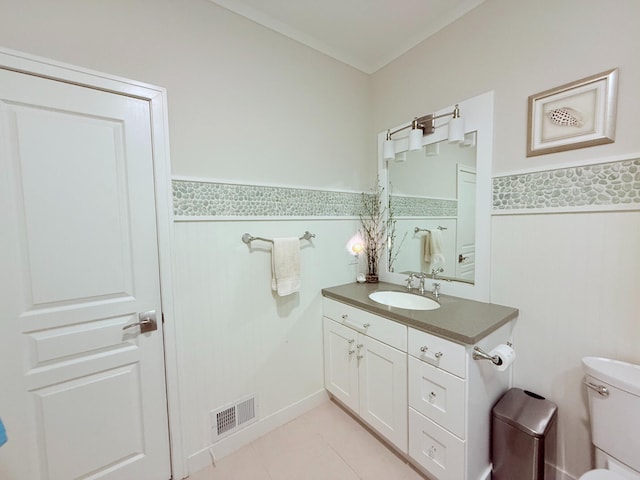 129 Ethel Dr, Roscommon, MI 48653 - bathroom with vanity, wainscoting, tile patterned flooring, and tile walls
