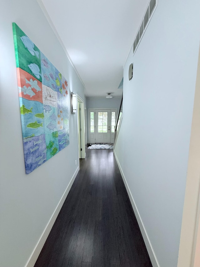 129 Ethel Dr, Roscommon, MI 48653 - hallway with dark wood-type flooring and baseboards