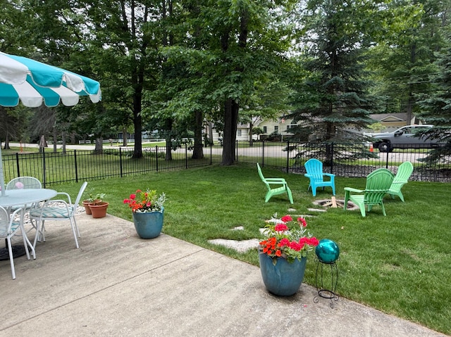 129 Ethel Dr, Roscommon, MI 48653 - view of yard with a patio area