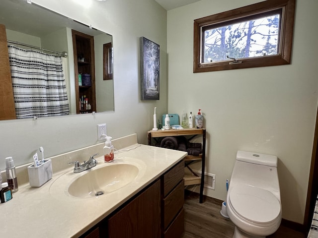 7984 US-23, Cheboygan, MI 49721 - full bathroom featuring wood finished floors and vanity