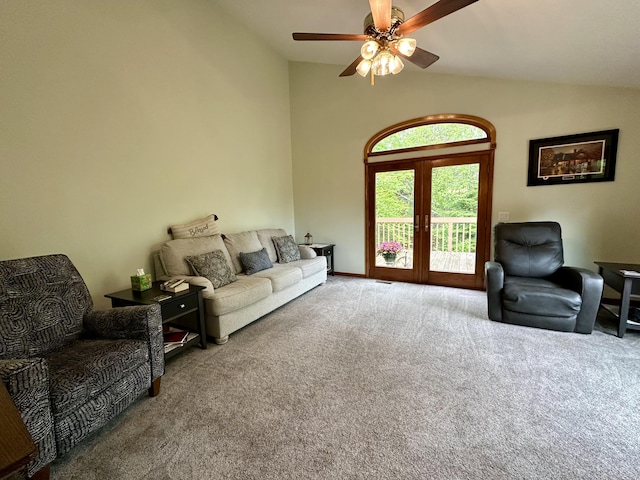 7984 US-23, Cheboygan, MI 49721 - living area with carpet floors, vaulted ceiling, and a ceiling fan