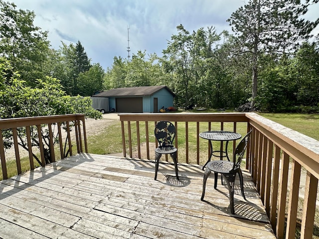 7984 US-23, Cheboygan, MI 49721 - wooden deck with a yard and an outbuilding