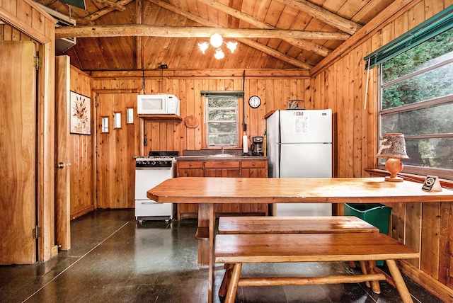 451 Gower Ln, Cheboygan, MI 49721 - kitchen with white appliances, wood ceiling, healthy amount of natural light, wood walls, and wood counters