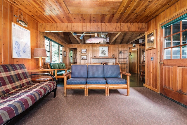 451 Gower Ln, Cheboygan, MI 49721 - carpeted living area featuring wooden walls and wooden ceiling