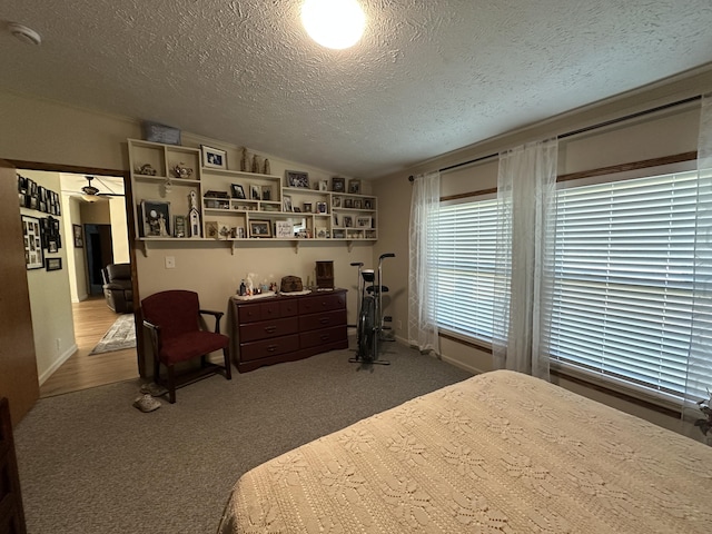 1632 Lakeview Dr, Alpena, MI 49707 - carpeted bedroom featuring a textured ceiling and vaulted ceiling