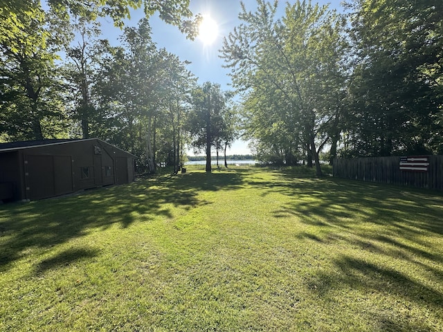 1632 Lakeview Dr, Alpena, MI 49707 - view of yard featuring an outdoor structure and a pole building