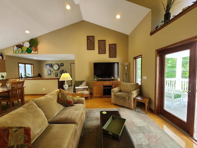 5825 Arawak Pass, Gaylord, MI 49735 - living room with high vaulted ceiling, recessed lighting, and light wood finished floors