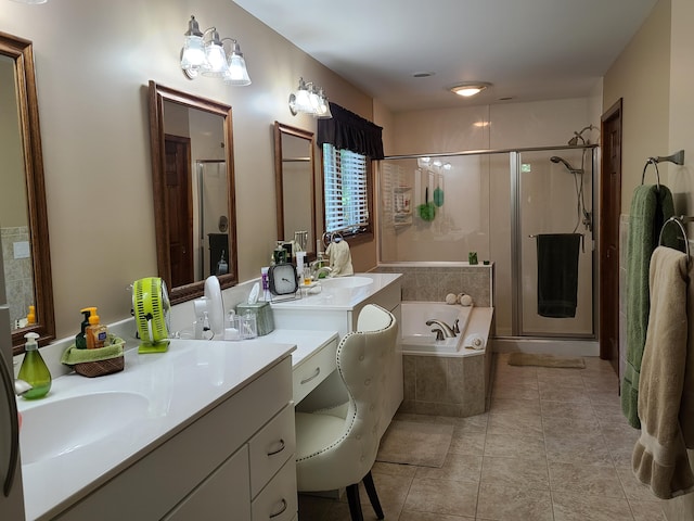 5825 Arawak Pass, Gaylord, MI 49735 - full bath featuring vanity, a shower stall, a garden tub, and tile patterned flooring