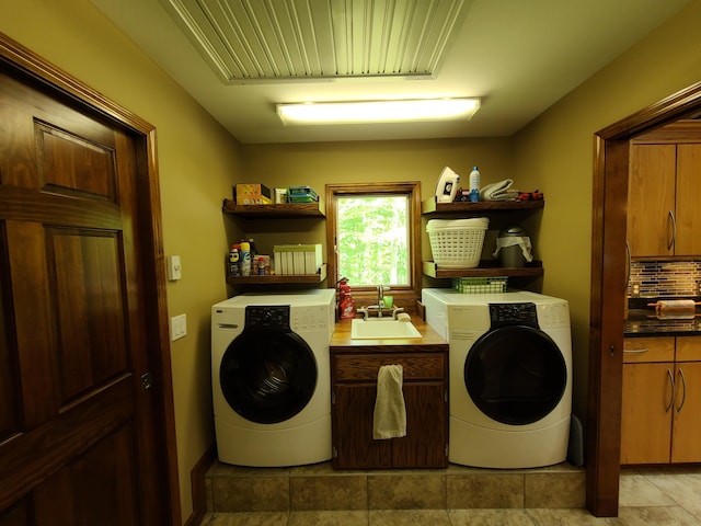 5825 Arawak Pass, Gaylord, MI 49735 - laundry area with cabinet space and washing machine and dryer