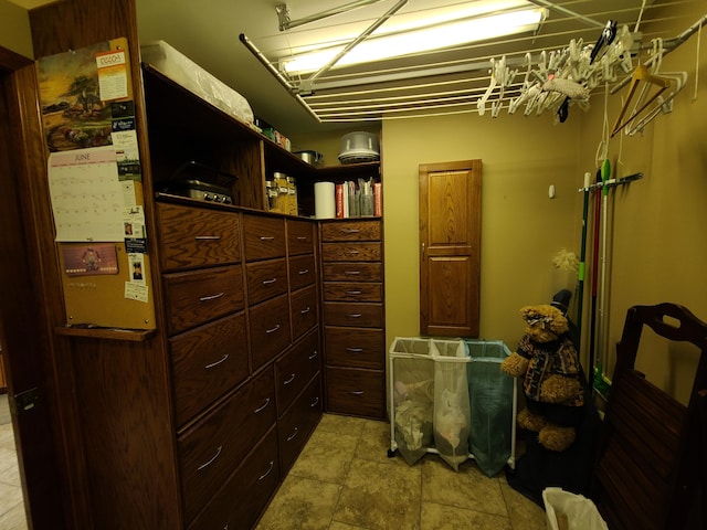 5825 Arawak Pass, Gaylord, MI 49735 - spacious closet featuring light stone finish floors