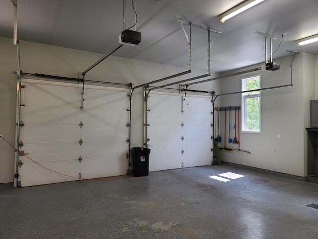 5825 Arawak Pass, Gaylord, MI 49735 - garage featuring a garage door opener