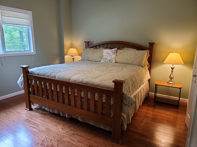 5825 Arawak Pass, Gaylord, MI 49735 - bedroom featuring hardwood / wood-style flooring