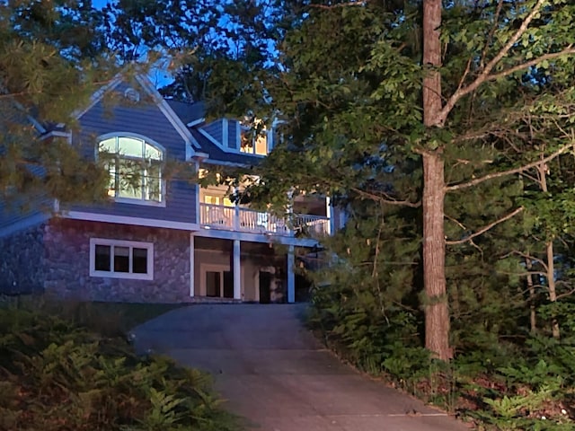 5825 Arawak Pass, Gaylord, MI 49735 - view of front of house featuring stone siding