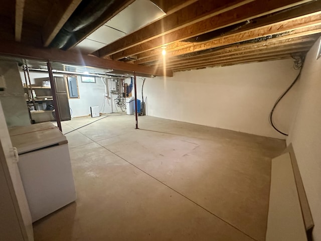 18440 Hardwood Trl, Hillman, MI 49746 - basement featuring refrigerator and electric panel