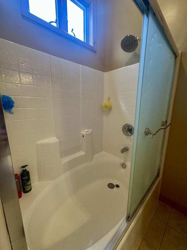 18440 Hardwood Trl, Hillman, MI 49746 - bathroom with tile patterned flooring and shower / bathtub combination