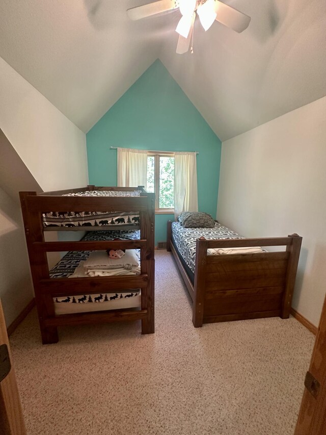 18440 Hardwood Trl, Hillman, MI 49746 - bedroom with carpet flooring, ceiling fan, and vaulted ceiling