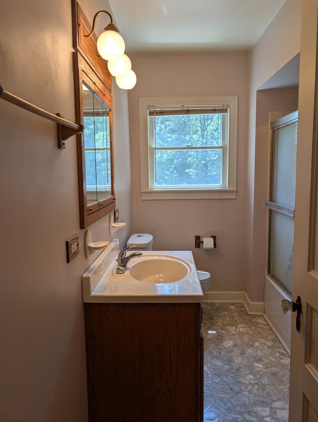 3090 S 37th Rd, Cadillac, MI 49601 - full bathroom featuring vanity and bath / shower combo with glass door