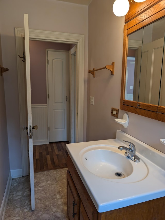 3090 S 37th Rd, Cadillac, MI 49601 - bathroom with vanity and baseboards