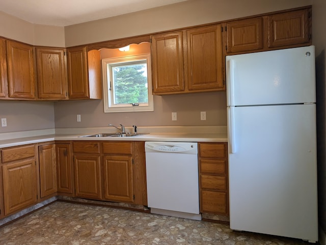 3090 S 37th Rd, Cadillac, MI 49601 - kitchen featuring white appliances, brown cabinetry, and light countertops