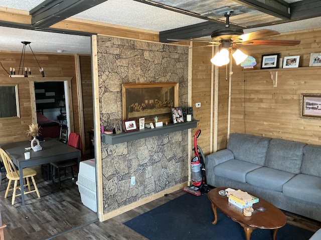 314 Sable St, Alpena, MI 49707 - living area featuring wood walls, a ceiling fan, and wood finished floors