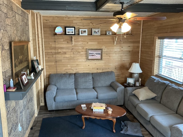 314 Sable St, Alpena, MI 49707 - living room with wooden walls, a ceiling fan, and wood finished floors