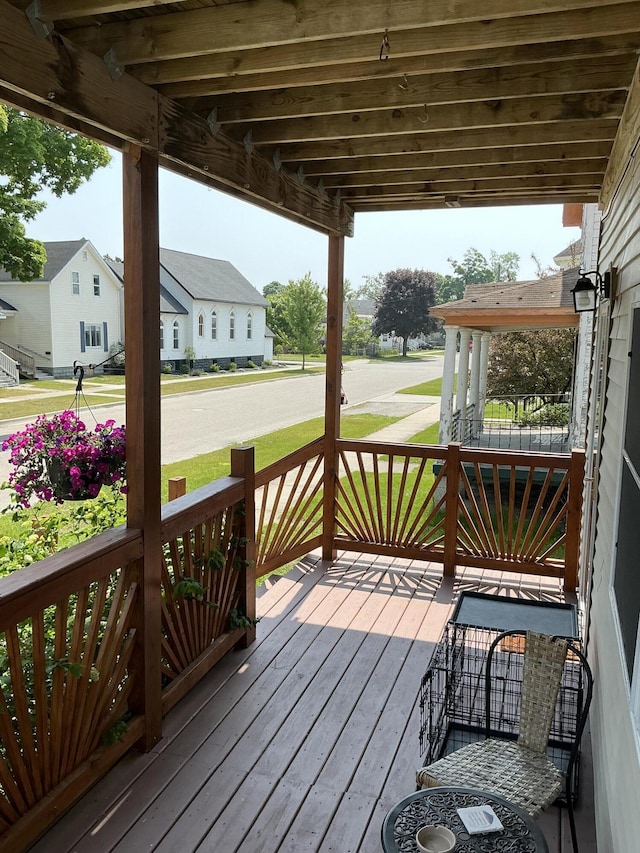 314 Sable St, Alpena, MI 49707 - porch with a residential view and a yard