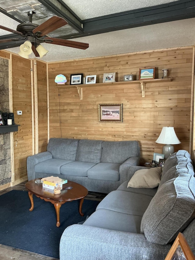314 Sable St, Alpena, MI 49707 - living room with wooden walls and ceiling fan