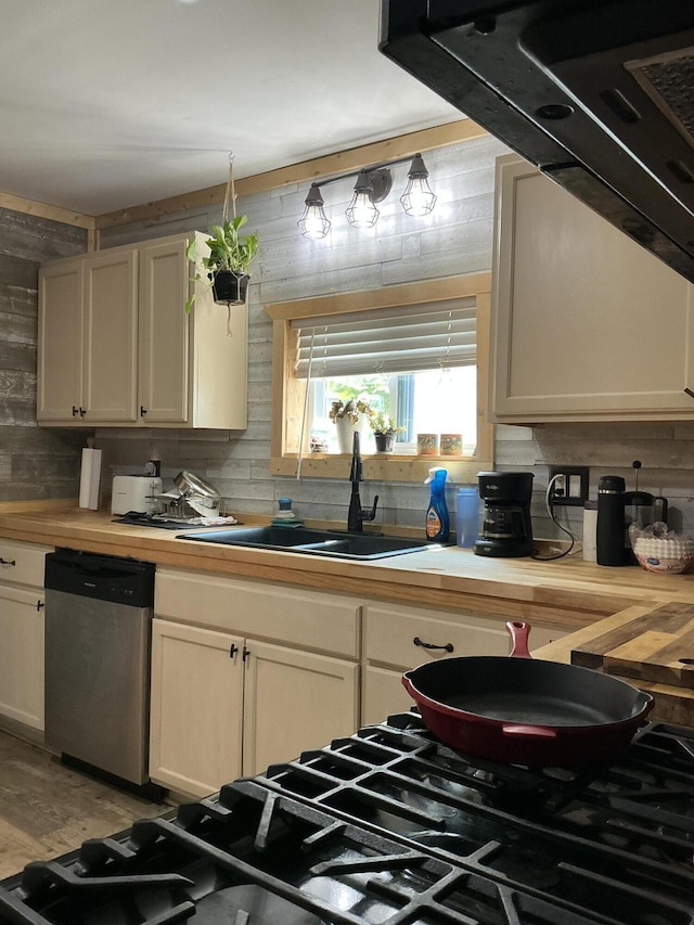 314 Sable St, Alpena, MI 49707 - kitchen featuring stainless steel dishwasher and butcher block counters