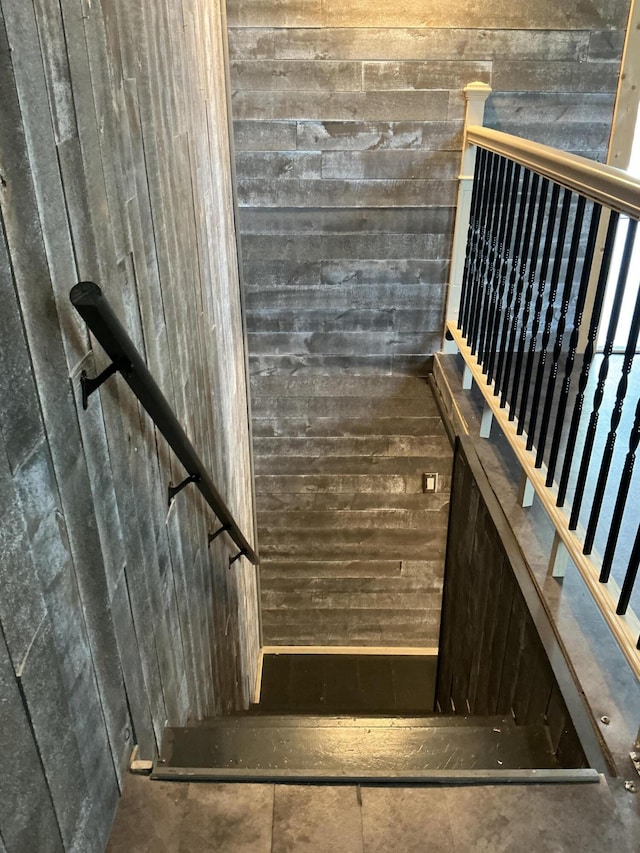 314 Sable St, Alpena, MI 49707 - staircase featuring wooden walls
