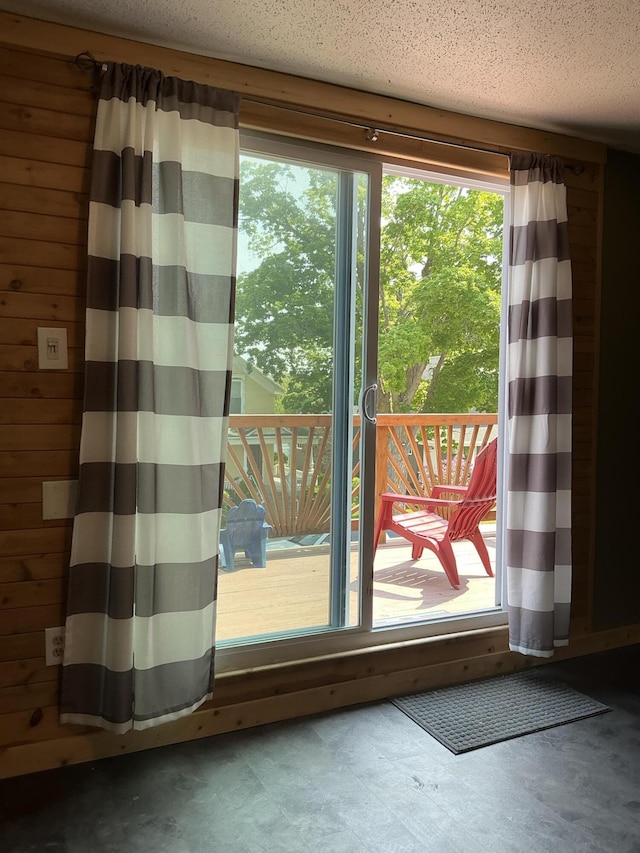 314 Sable St, Alpena, MI 49707 - doorway featuring wood walls