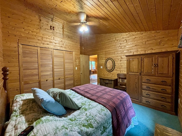 13333 S Black River Rd, Onaway, MI 49765 - bedroom featuring carpet, wooden ceiling, wood walls, high vaulted ceiling, and a closet