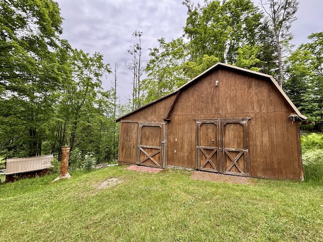 13333 S Black River Rd, Onaway, MI 49765 - view of barn featuring a lawn