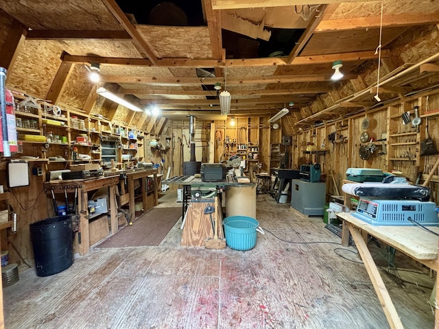13333 S Black River Rd, Onaway, MI 49765 - miscellaneous room featuring a workshop area