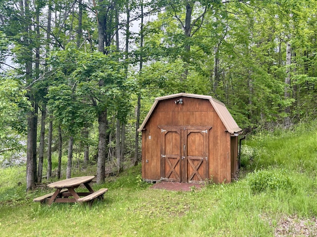 13333 S Black River Rd, Onaway, MI 49765 - view of shed featuring a forest view