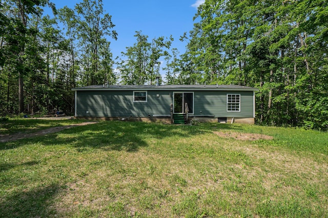 7539 E M-32, Johannesburg, MI 49751 - back of house with entry steps and a lawn