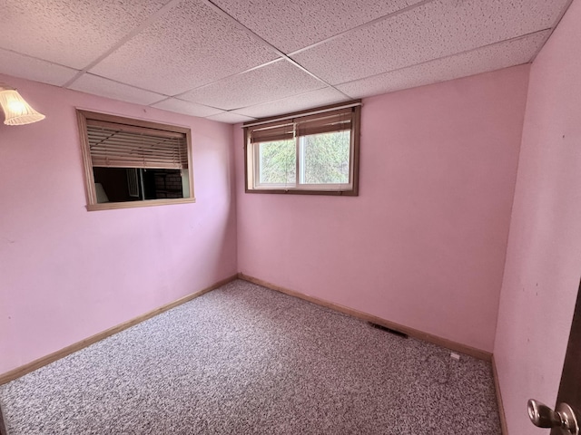 2833 S Horseshoe Trl, Grayling, MI 49738 - carpeted empty room with a drop ceiling and baseboards