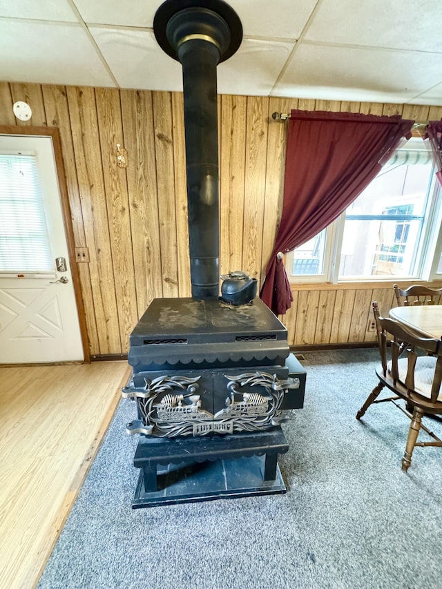 2833 S Horseshoe Trl, Grayling, MI 49738 - detailed view of a wood stove, wood walls, and wood finished floors