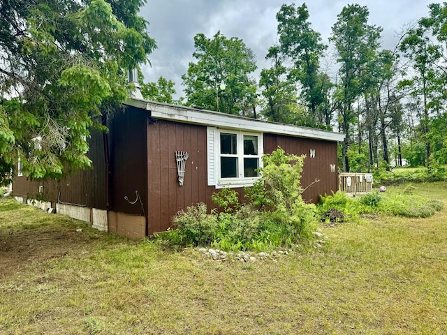 2833 S Horseshoe Trl, Grayling, MI 49738 - view of property exterior featuring a yard