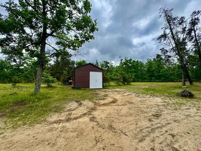 2833 S Horseshoe Trl, Grayling, MI 49738 - view of yard with a storage unit