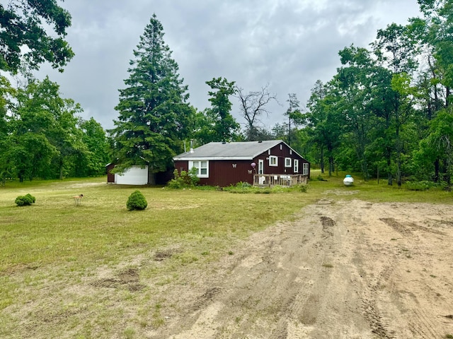 2833 S Horseshoe Trl, Grayling, MI 49738 - view of green lawn featuring dirt driveway