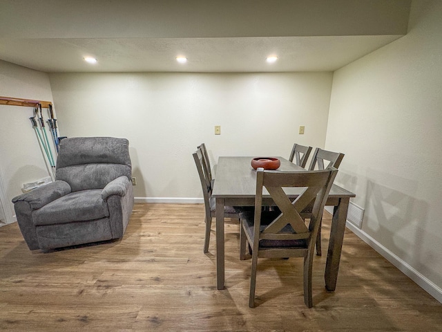18680 Red Pine Dr, Hillman, MI 49746 - dining room with recessed lighting and wood finished floors