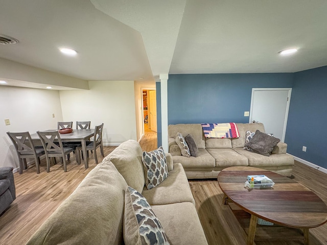 18680 Red Pine Dr, Hillman, MI 49746 - living room featuring wood finished floors and recessed lighting