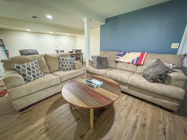 18680 Red Pine Dr, Hillman, MI 49746 - living area featuring wood finished floors and recessed lighting