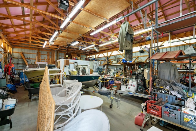 10134 Upper Mograin Rd, Cheboygan, MI 49721 - garage featuring a workshop area