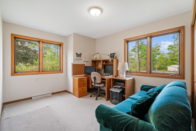 10134 Upper Mograin Rd, Cheboygan, MI 49721 - home office with healthy amount of natural light, baseboard heating, and light carpet